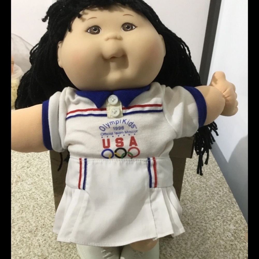 Cabbage Patch kid in White Outfit with Blue Trim and USA Team Mascot